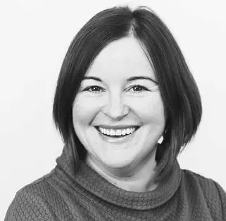 Black and white photo of Miss Stephanie West, ophthalmic surgeon in the UK