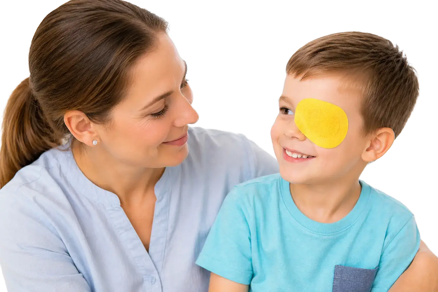 Smiling child wearing an eye patch during amblyopia (lazy eye) treatment with a parent providing support.